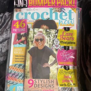 Photograph off the latest issue of Crochet Now on a black background